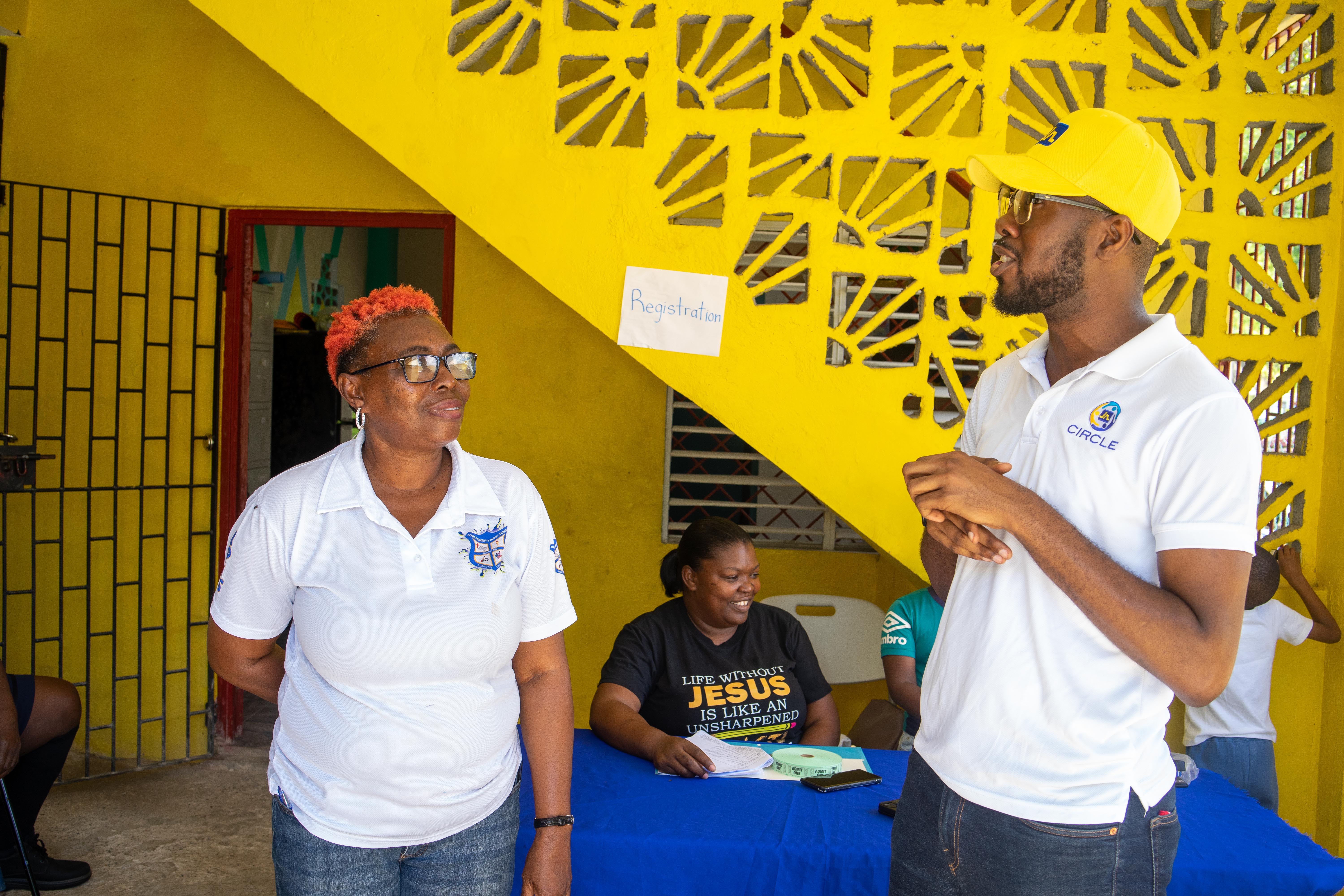 Lethe Primary principal Allison McGhie with Omar Wright of the JN Foundation during a relief mission